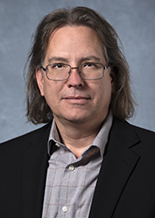 Headshot of David Underhill, PhD. Winner of the 2020 Cedars-Sinai Prize for Research in Scientific Medicine (PRISM) award.