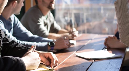 Group of people meeting in an office.