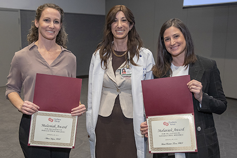 Odelia B. Cooper, MD, director of the Clinical and Translational Research Center, (center) is shown with award winners Adina Hazan, PhD, (left) and Lucia Barbier-Torres, PhD.