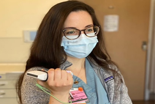 Cedars-Sinai Cecilia Leggett, MD holding an ultrasound probe